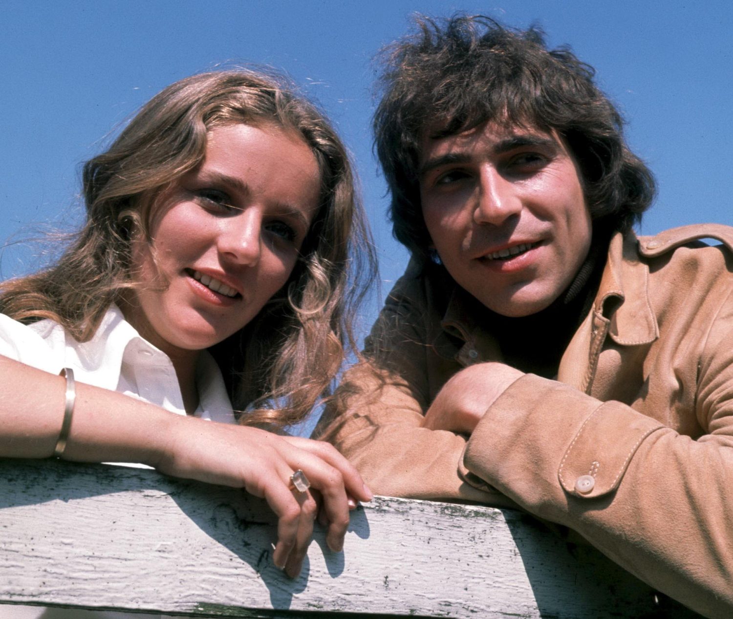All About Emmerdale: Marian Wilks and Jack Sugden smile while leaning on a gate. 