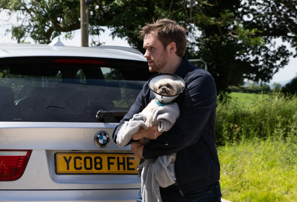 Tom with Piper the Dog in Emmerdale