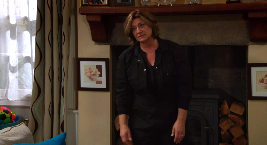 Moira slumps her shoulders and gives Cain a hard time in Emmerdale