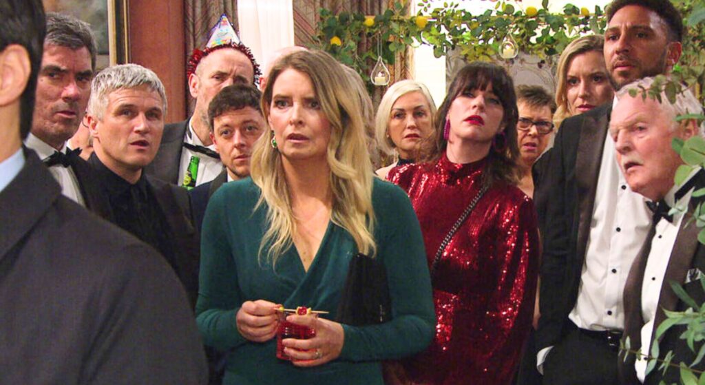 The attendees of Lydia Dingle's party all look shocked and confused on Emmerdale (Credit: ITV/Composite: EI)