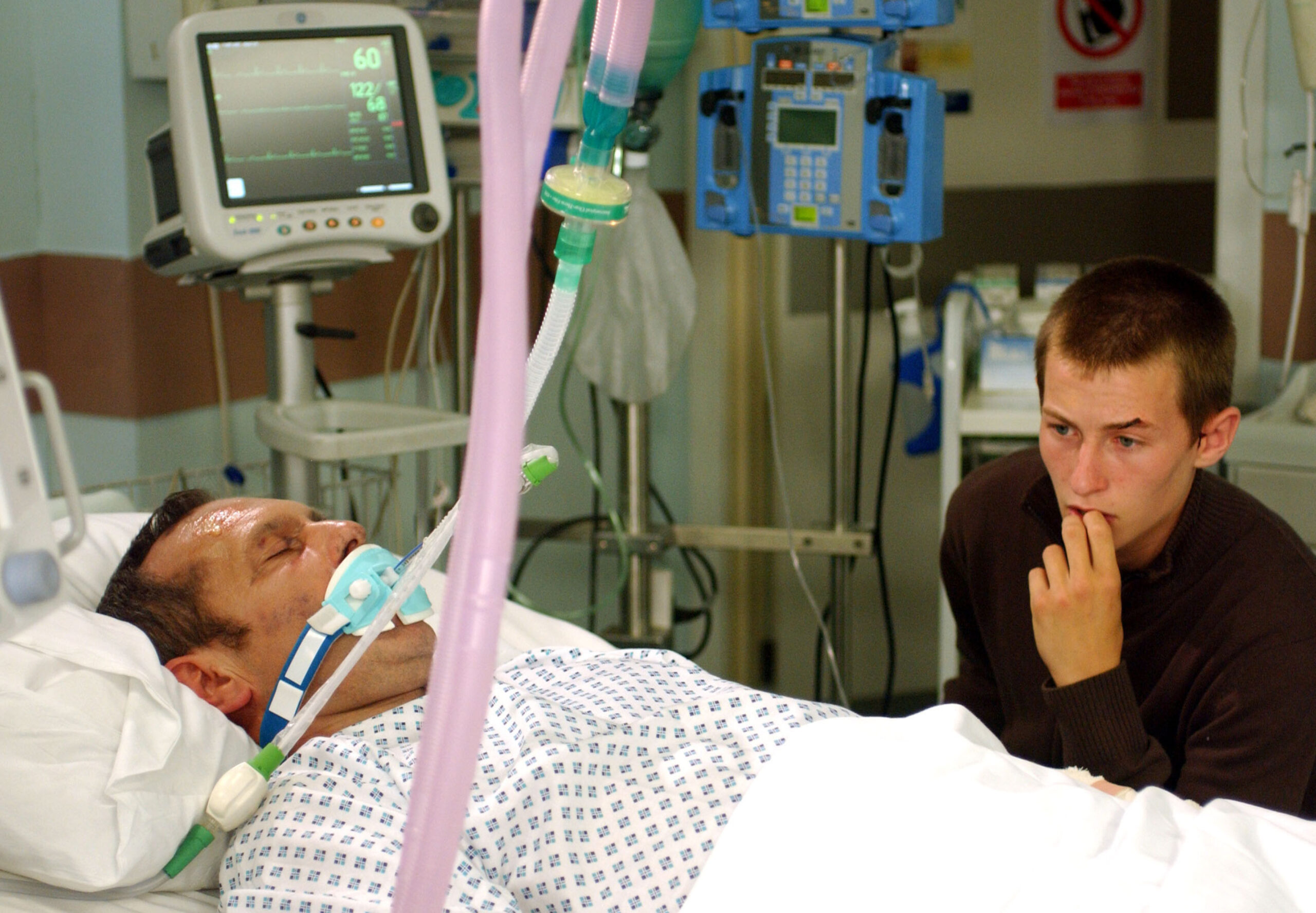 Billy in hospital with Daz by his side