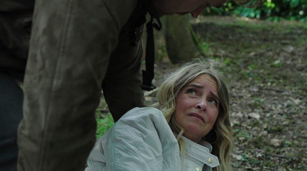 Charity falls over in the woods in Emmerdale