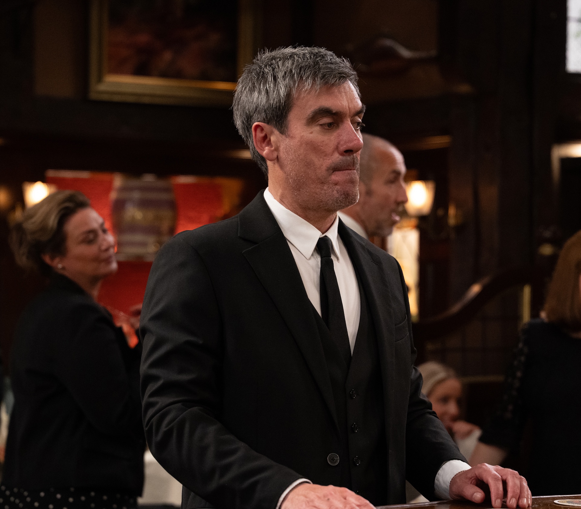 Cain at Nate's funeral