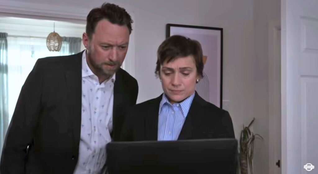 Liam and Walsh read the note on Owen's laptop (Credit: ITV)