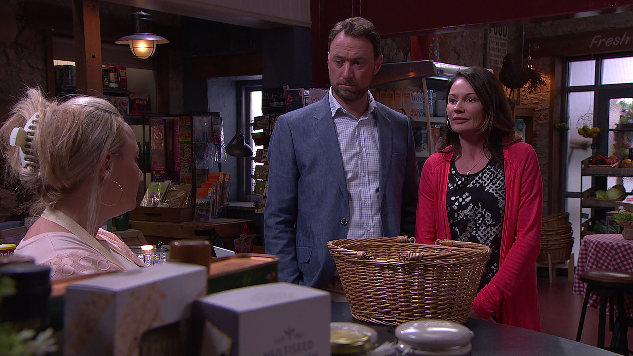 Tracy chats to Liam and Chas in the shop