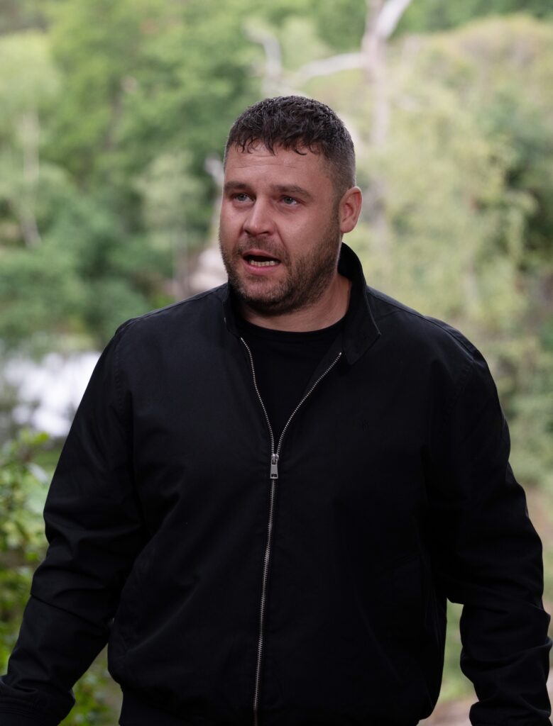Aaron looks frightened in Emmerdale