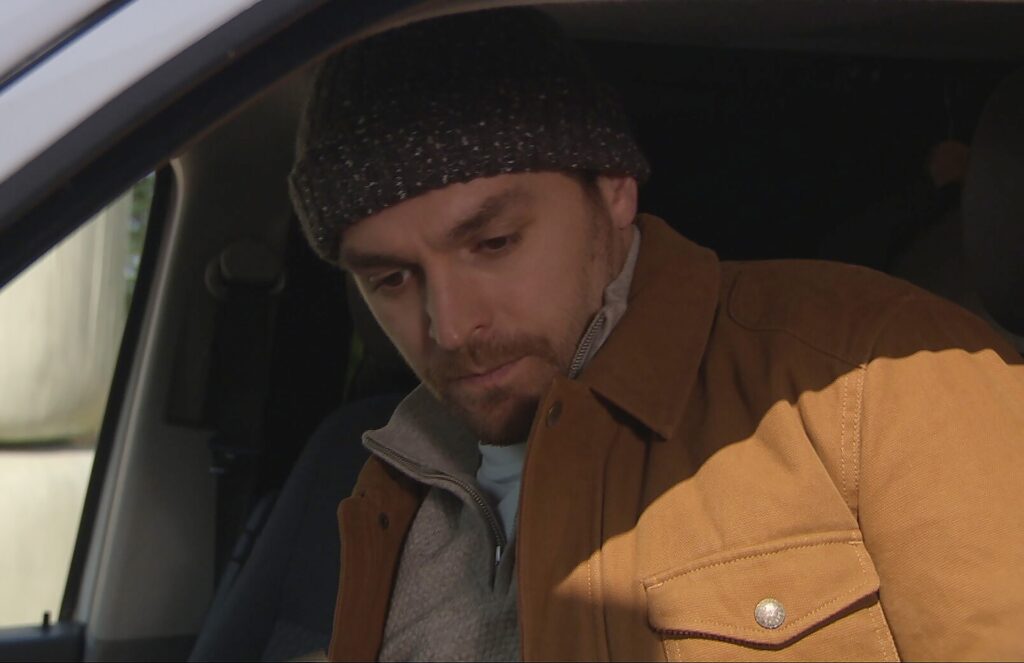 Mack finds something in John's campervan 
