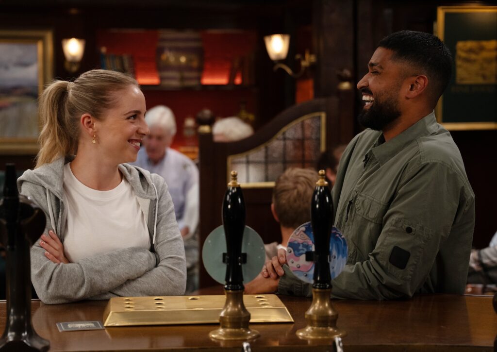 Belle and Kammy laugh together in Emmerdale
