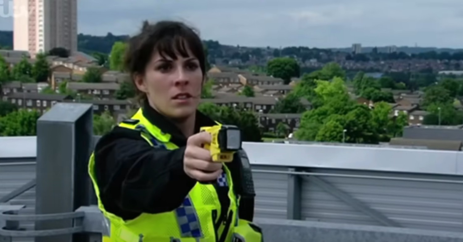 Donna with a tazer on the roof on Emmerdale