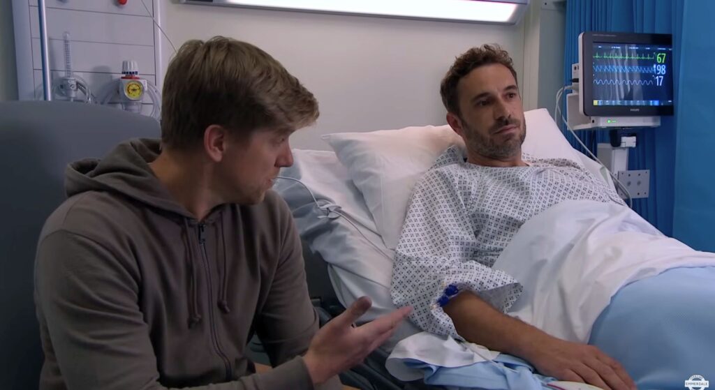 Robert apologised to smug John in the hospital (Credit: ITV)