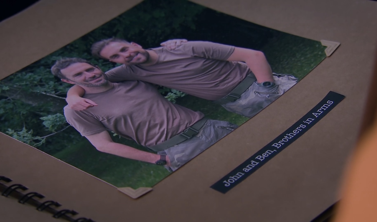 A photo in a scrapbook depicts Emmerdale's John with removal man, Ben