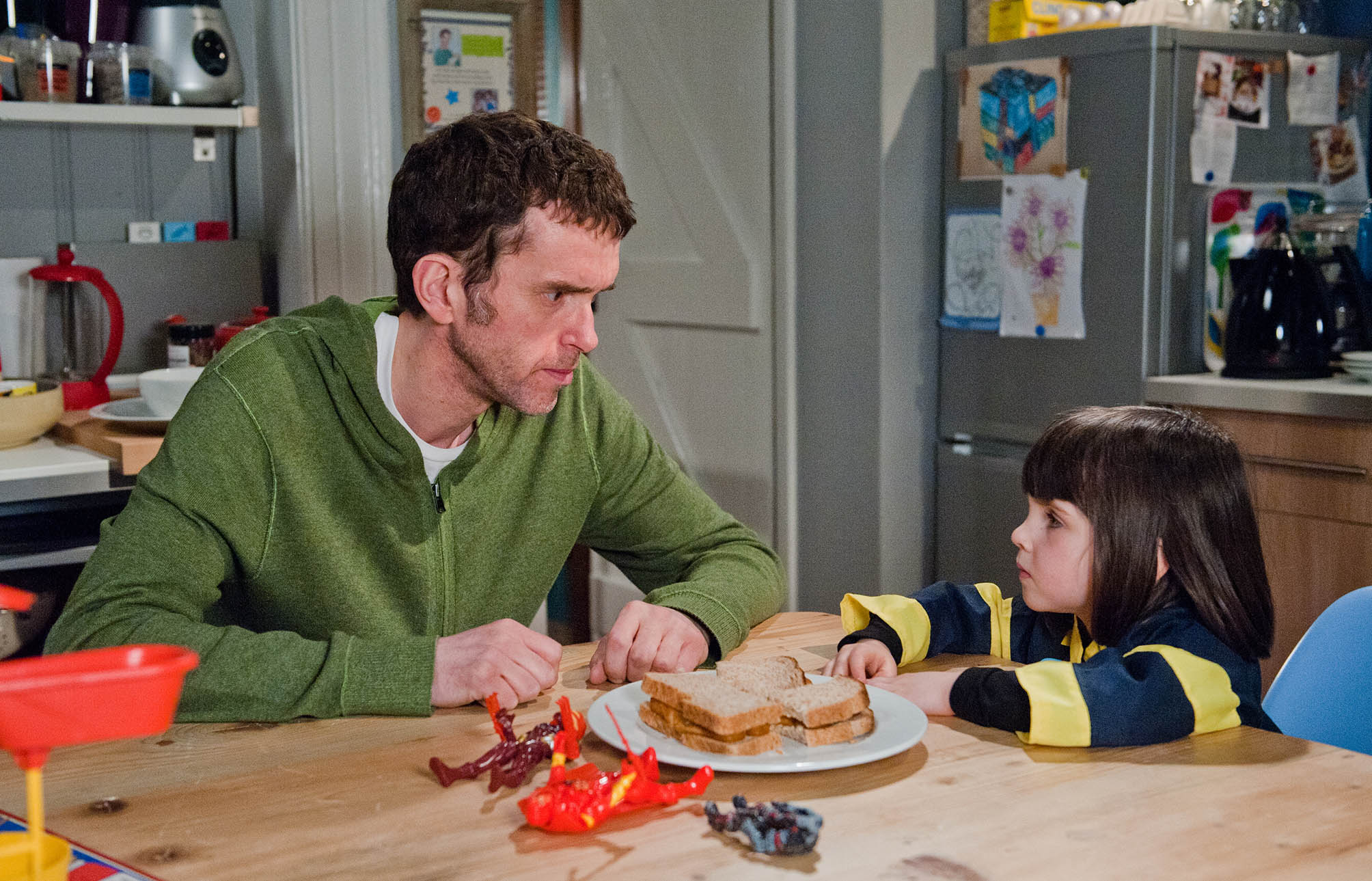 Marlon looks at little April on Emmerdale