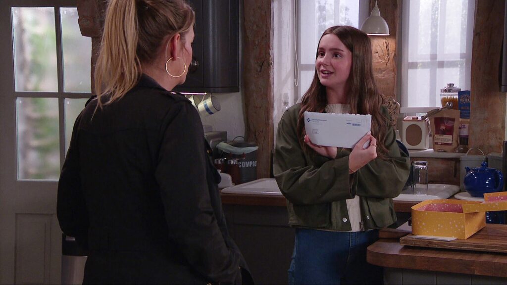 Sarah shows Charity a letter