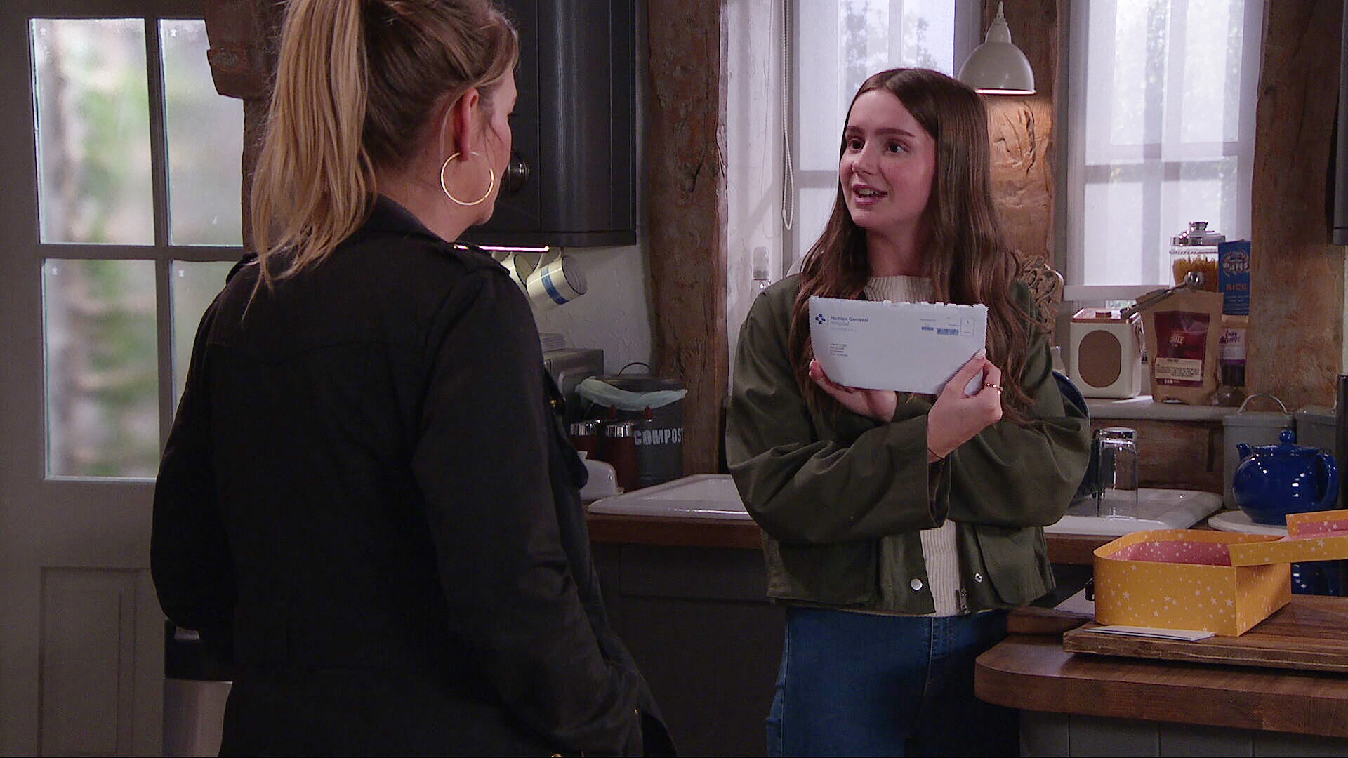 Sarah shows Charity a letter