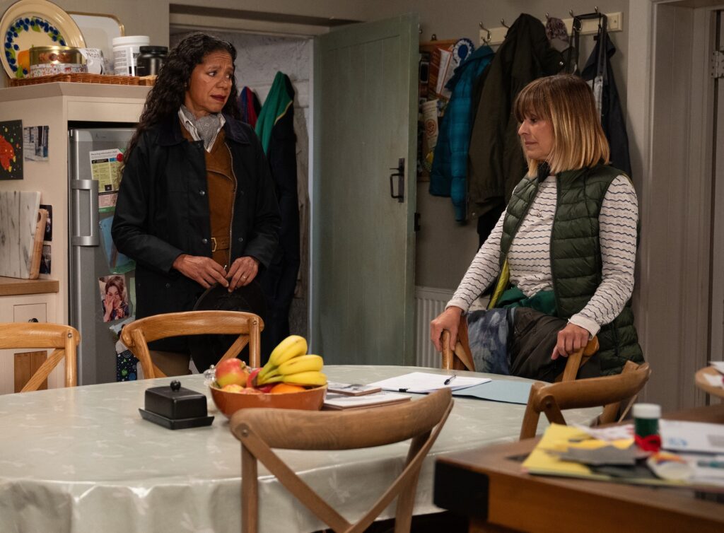 Celia and Rhona talk in the kitchen of Butlers in Emmerdale