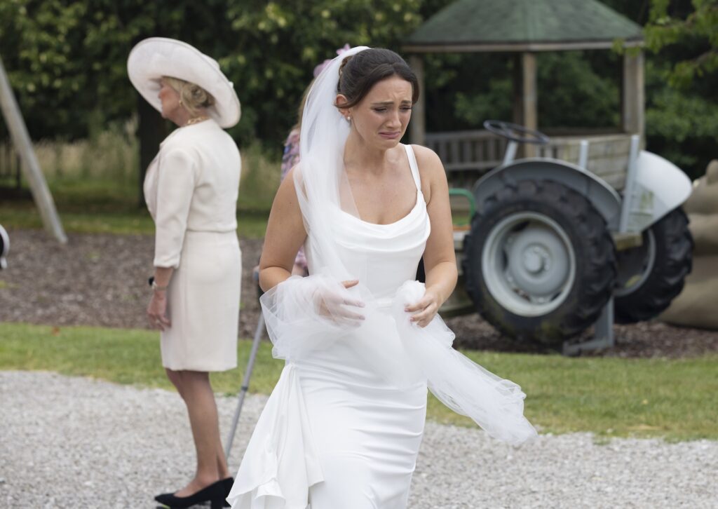 Gabby flees the church in tears