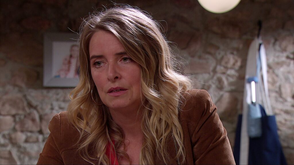Charity looks guilty in Emmerdale
