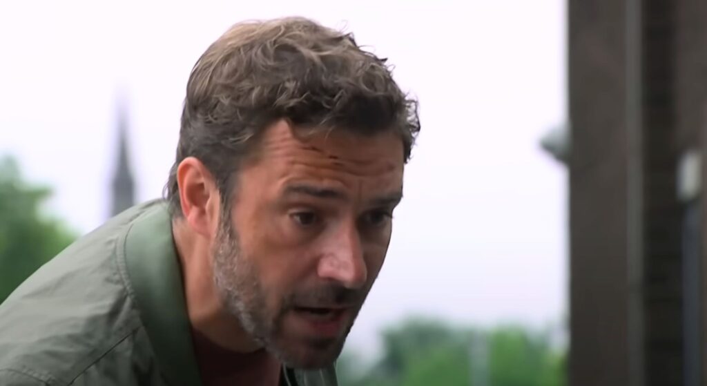 John is lurking in the village (Credit: ITV)