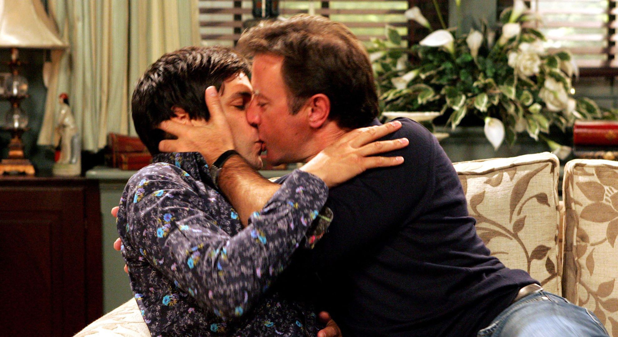 Gray kisses Paul