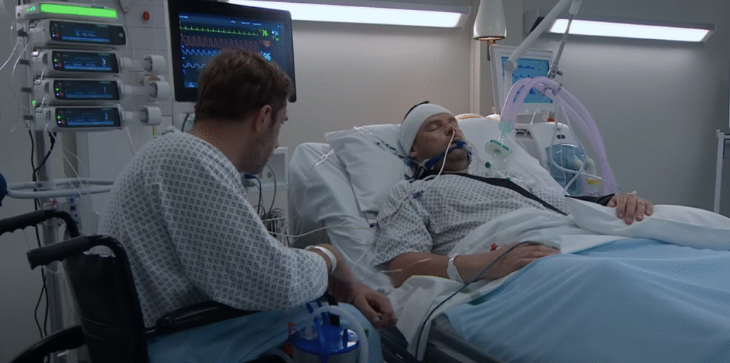 John and Aaron in the hospital in Emmerdale