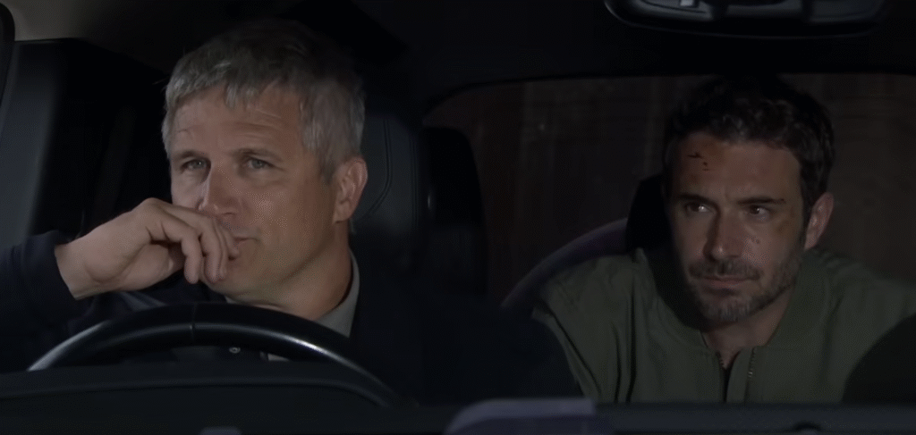 Caleb and John talking in a car in Emmerdale