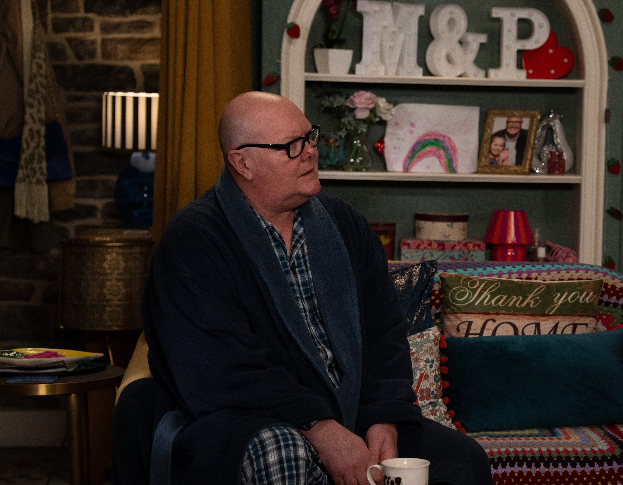 Paddy looks sad as he sits down on a chair