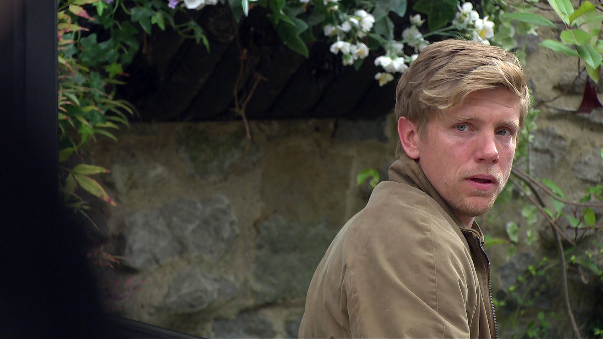 Robert looks shocked in Emmerdale