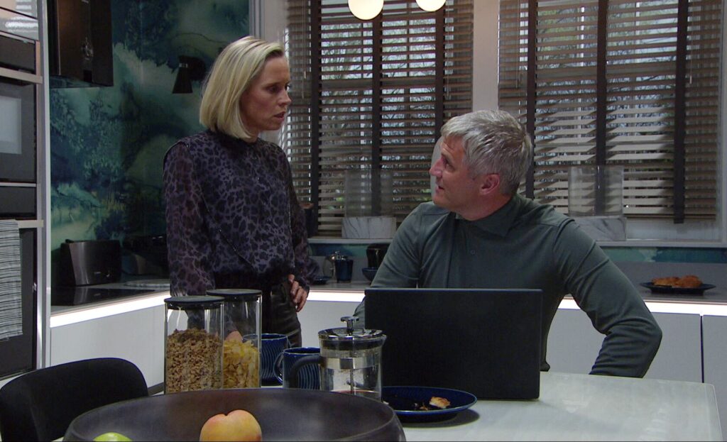 Caleb and Dawn talk in their kitchen