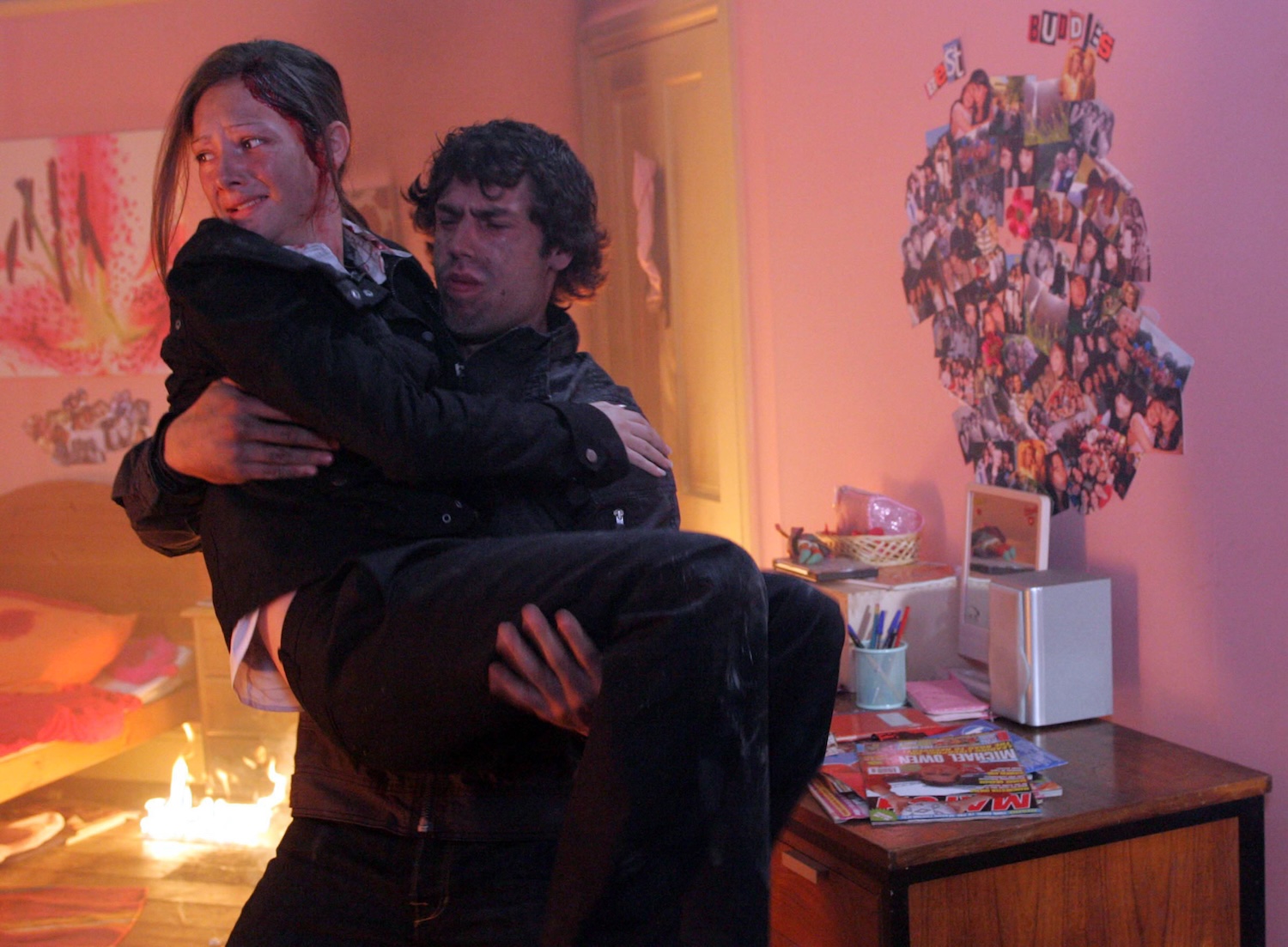 Andy rescues Victoria from the fire