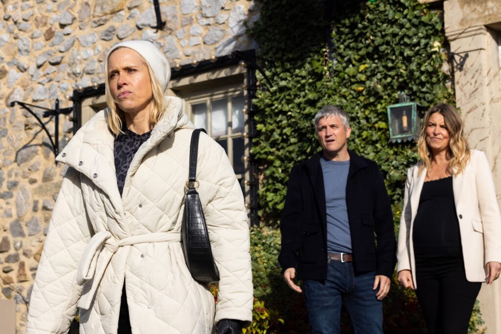 Ruby walking away from Caleb and Charity 