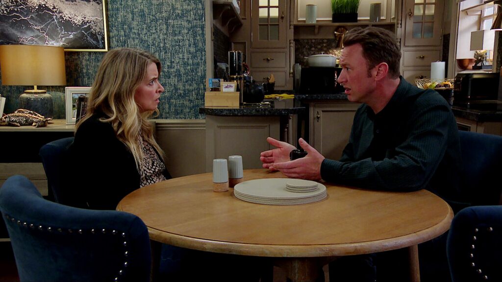 Charity and Liam have a chat in the back room of The Woolpack