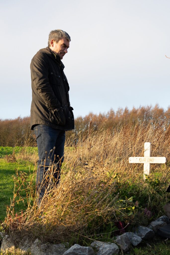 Cain tries to make sense of his cancer news as he visit dad Zak's grave (Credit: ITV)