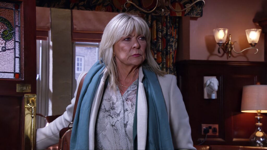 Kim is suspicious of Graham and Cain's meeting (Credit: ITV)