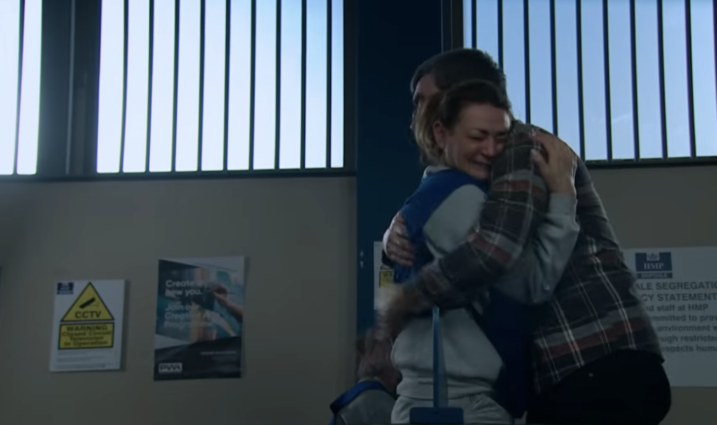 Cain and Moira hugging in Emmerdale emotionally
