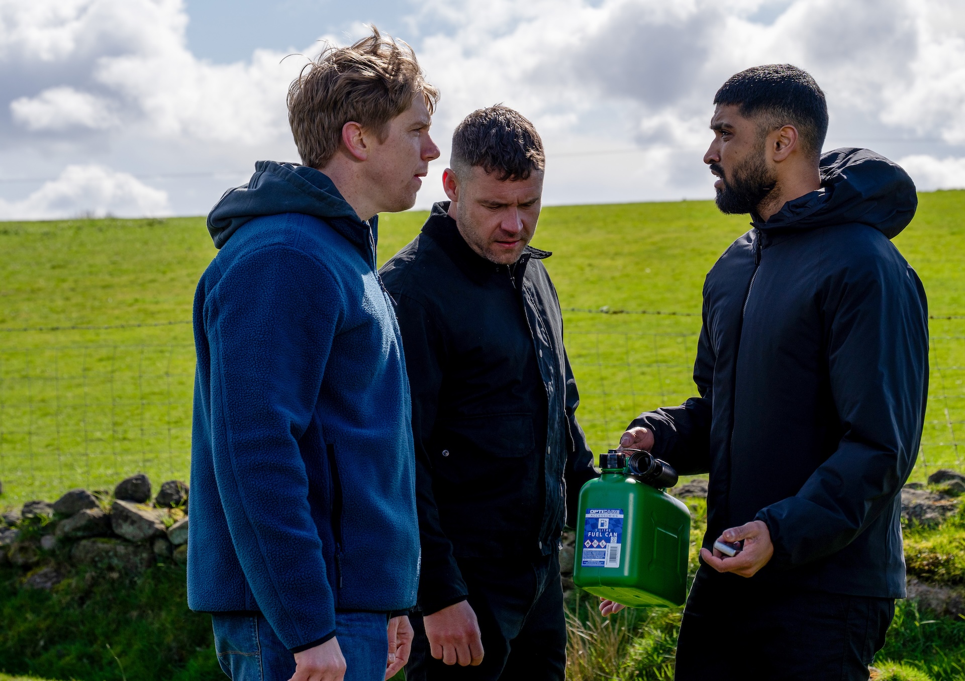 Robert and Aaron catch Kammy with a petrol can and lighter (Credit: ITV)