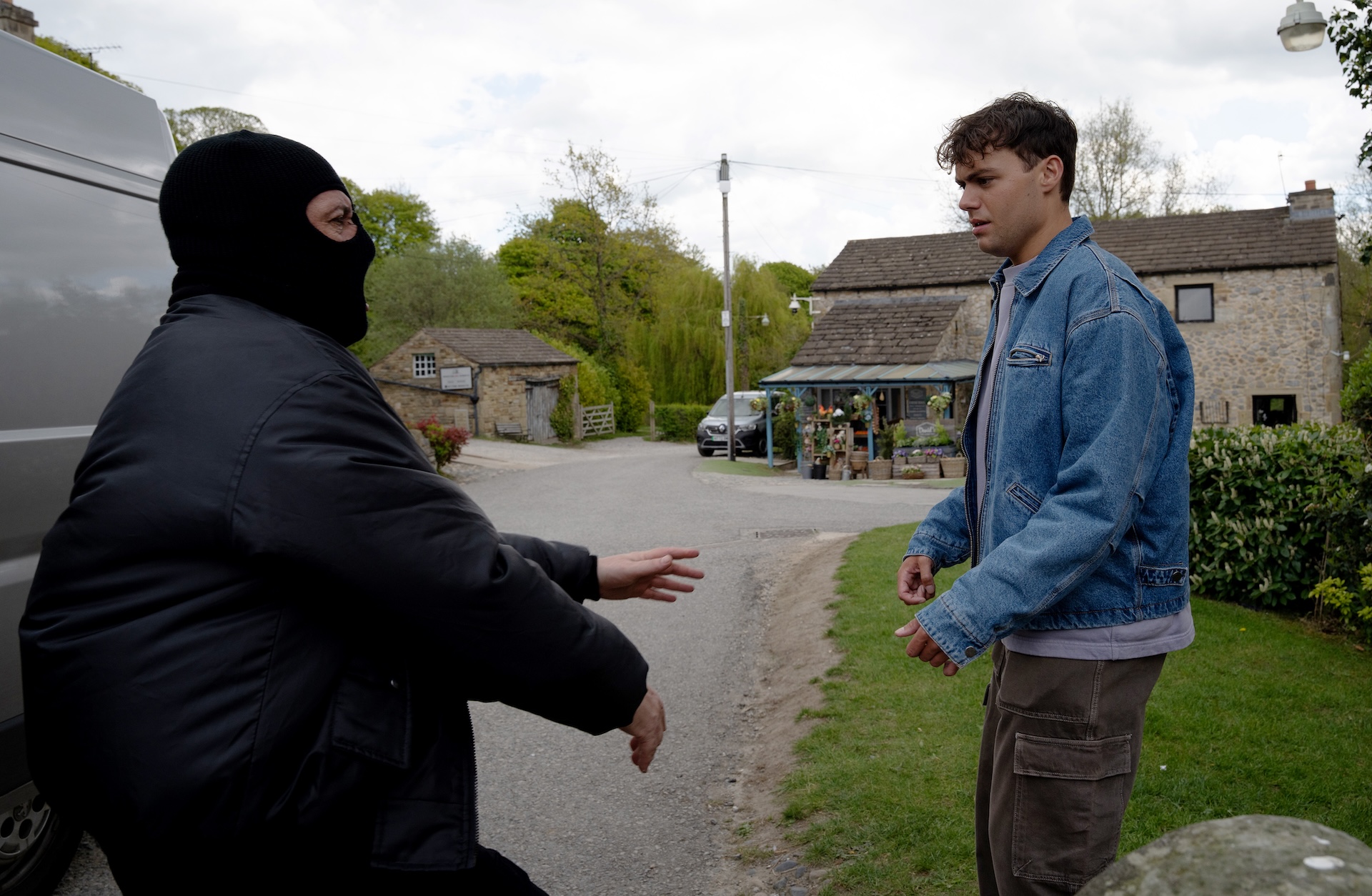 Masked men confront Lewis (Credit: ITV)