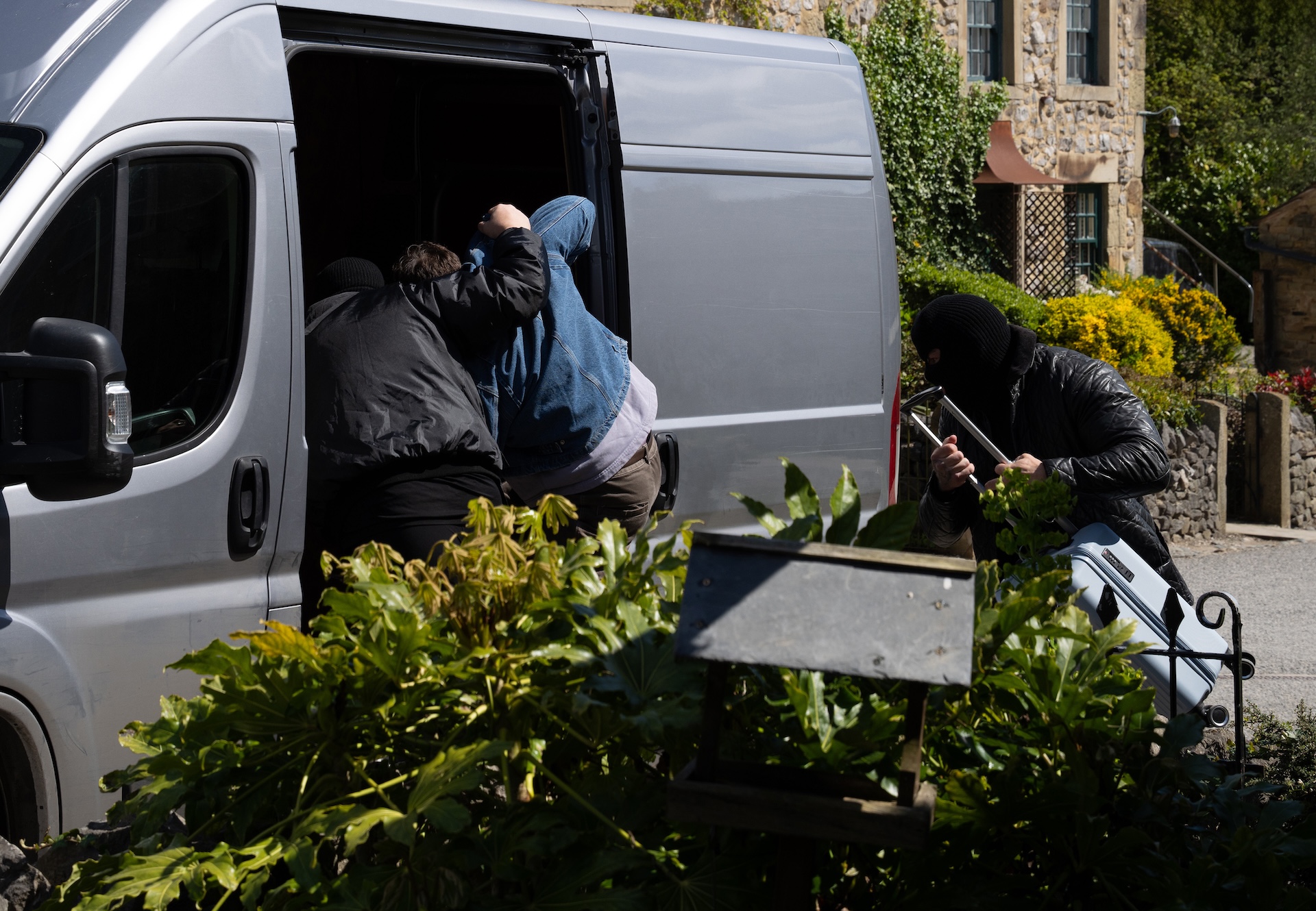 Masked men throw Lewis into their van (Credit: ITV)