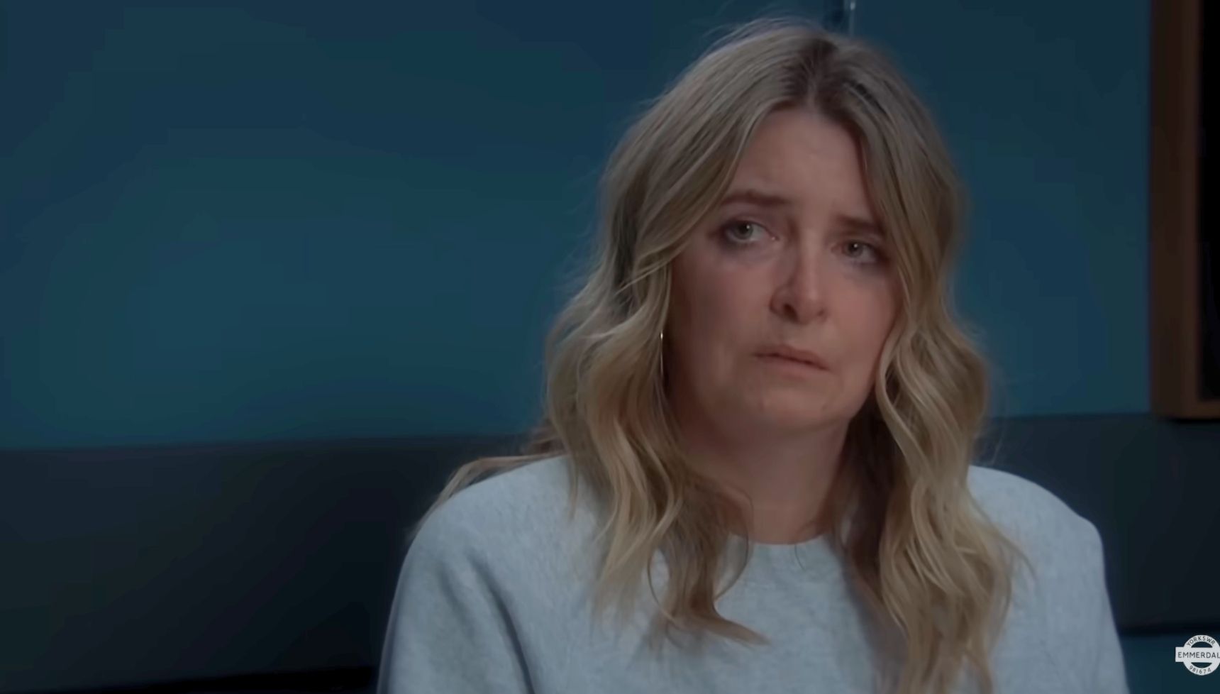 Charity is traumatised and police officer DS Reid believes her in Emmerdale (Credit: ITV)
